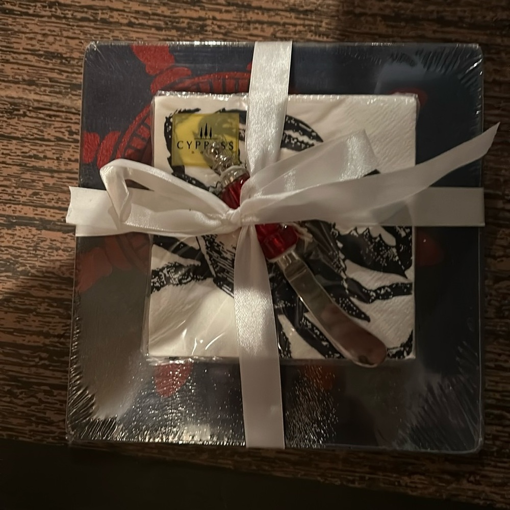 Cheese board, spreader and cocktail napkins.  Brand new